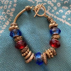 Red blue and gold beaded European charm bracelet